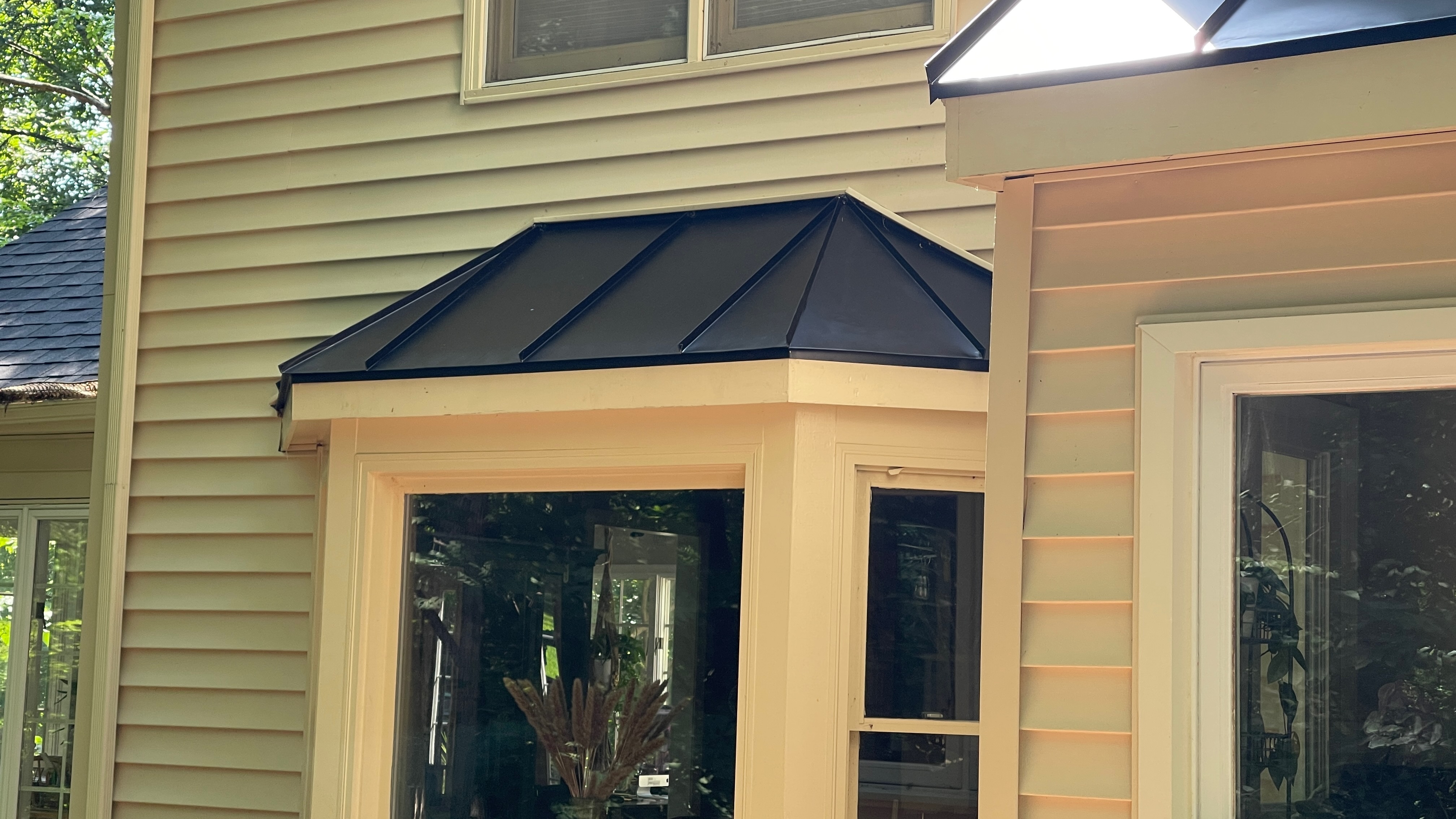 Crew installing a metal roof in Northern Virginia